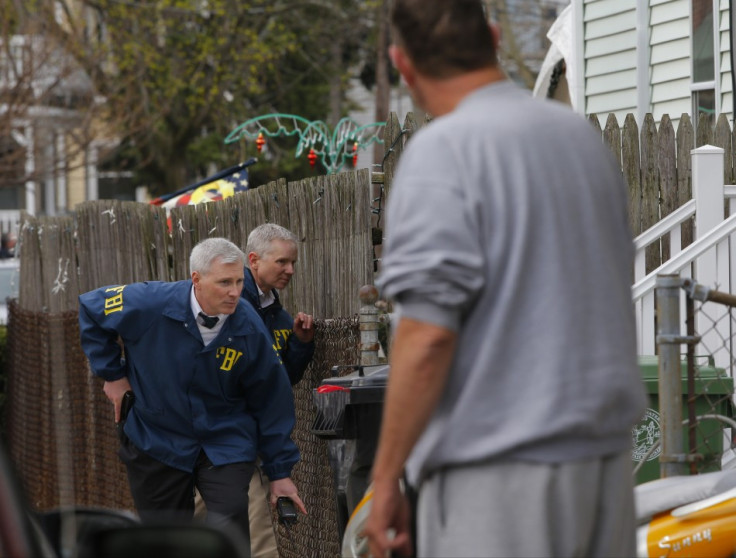 FBI agents search homes for the Boston Marathon bombing suspects in Watertown