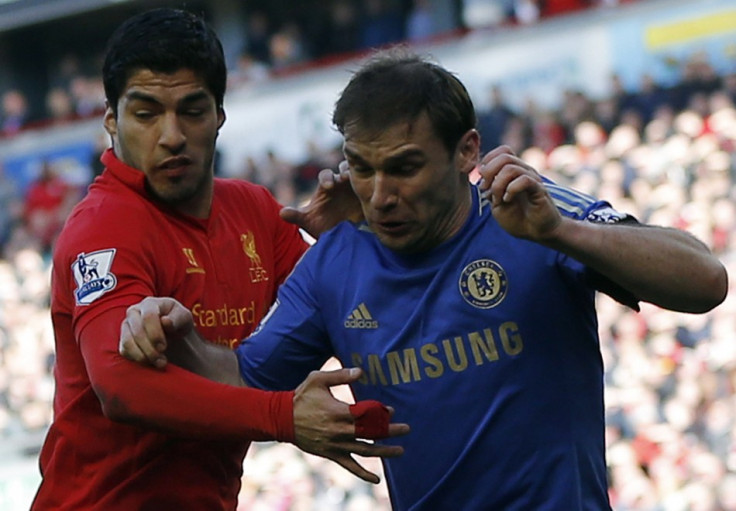 Luis Suarez (L) and Branislav Ivanovic