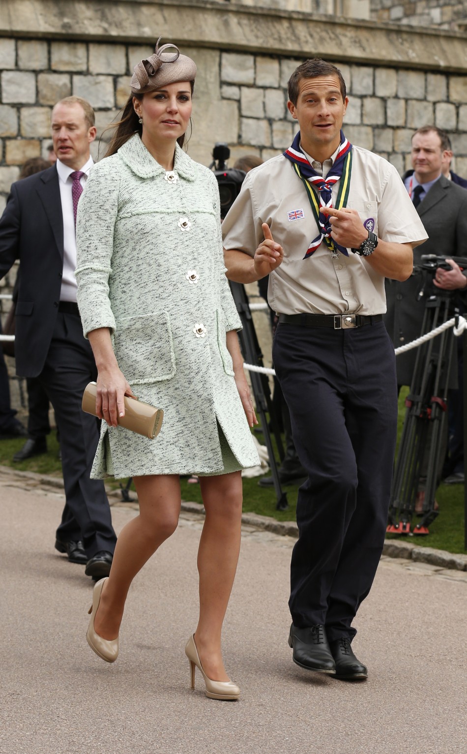 Britains Catherine, Duchess of Cambridge and Chief Scout Bear Grylls R attend the National Review of Queens Scouts at Windsor Castle in Berkshire, near London April 21, 2013.