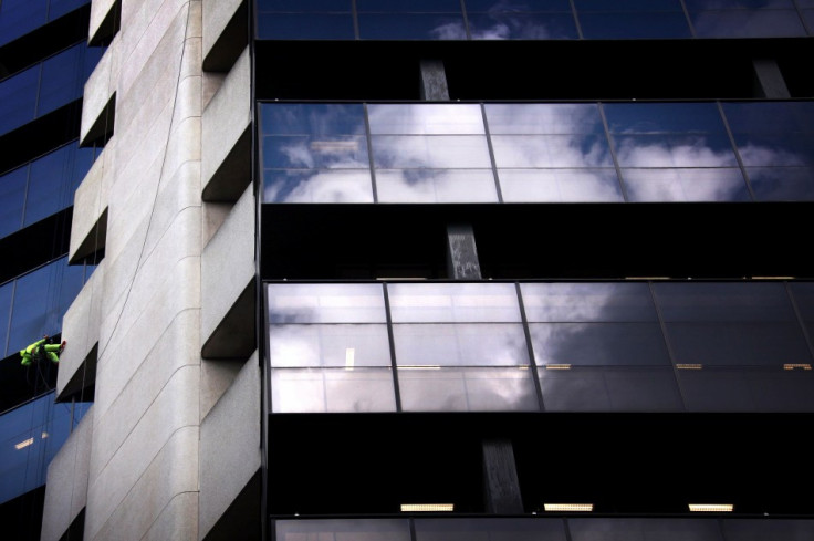 Clouds are reflected in the windows of a building in Sidney