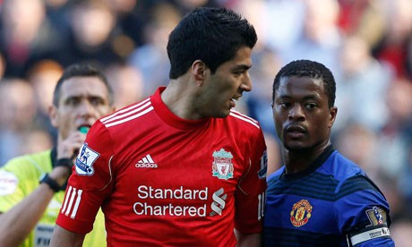 Luis Suarez and Patrice Evra