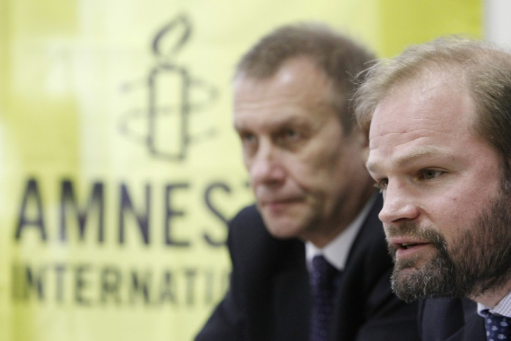 John Dalhuisen (R), Deputy Director for Europe and Central Asia at Amnesty International,