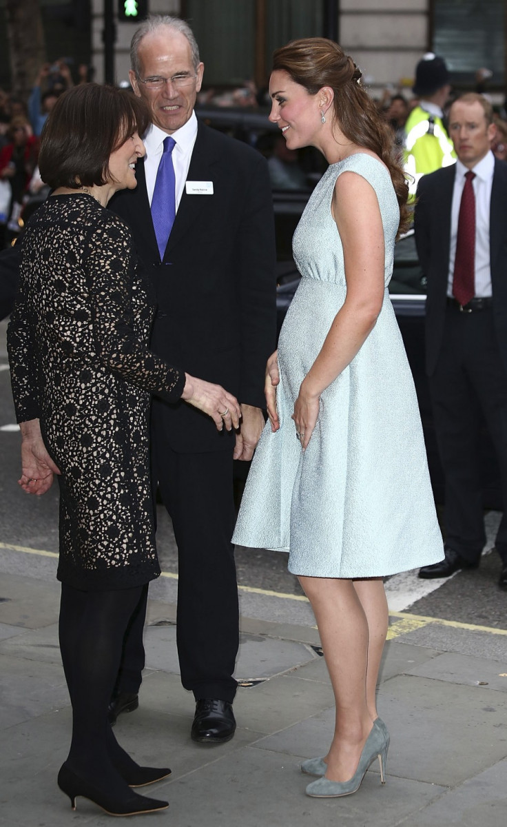 Britain's Catherine, Duchess of Cambridge is met by National Portrait Gallery director Sandy Nairne and Art Room charity founder Juli Beattie (L) before a reception at the National Portrait Gallery in London April 24, 2013.