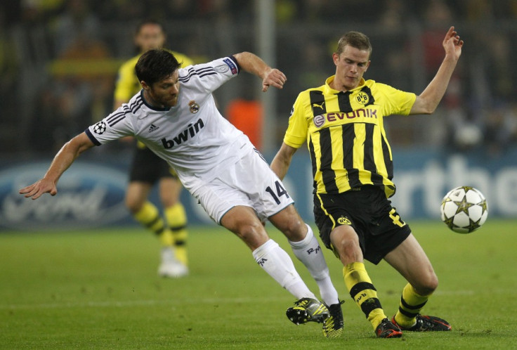 Sven Bender challenges Xabi Alonso