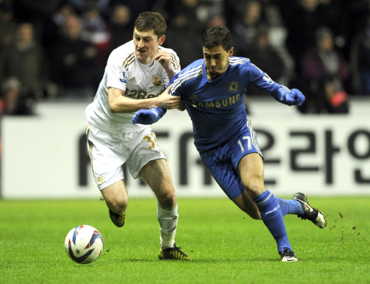 Ben Davies (L) and Eden Hazard