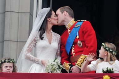 Prince William and his wife Catherine, Duchess of Cambridge kiss on the balcony of Buckingham Palace, following their wedding at Westminster Abbey in London April 29, 2011