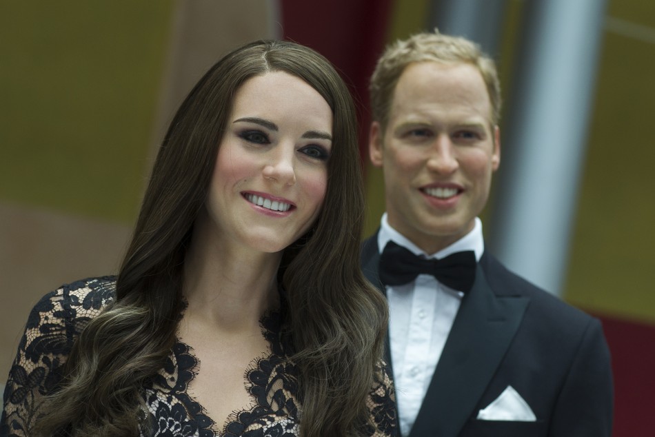 Wax figures of Kate Middleton, Duchess of Cambridge, and Prince William are on display during a media reception at the British embassy in Berlin, August 16, 2012.