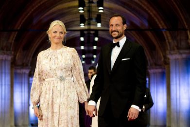 Norway's Crown Princess Mette-Marit and Crown Prince Haakon (R) arrive at a gala dinner organised on the eve of the abdication of Queen Beatrix of the Netherlands and the inauguration of her successor King Willem-Alexander at the Rijksmuseum in Amste