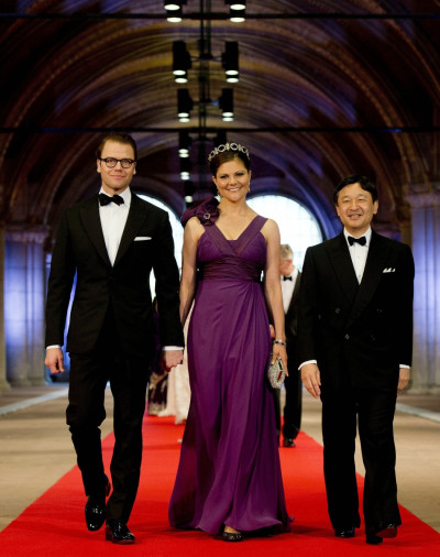 Crown Princess Victoria C of Sweden, her husband Prince Daniel L and Crown Prince Naruhito of Japan arrive at a gala dinner organised on the eve of the abdication of Queen Beatrix of the Netherlands and the inauguration of her successor King Willem-Al