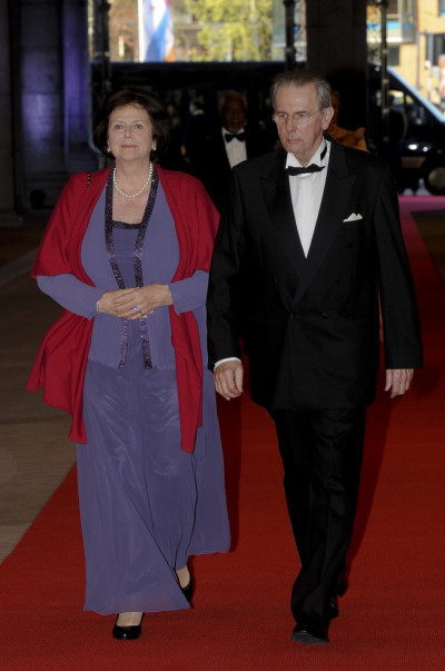 International Olympic Committee IOC President Jacques Rogge R and his wife Anne Rogge arrive at a gala dinner organised on the eve of the abdication of Queen Beatrix of the Netherlands and the inauguration of her successor King Willem-Alexander at the