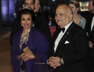 Jordans Prince Hassan Bin Talal R and his wife Princess Sarvath El Hassan bin Talal arrive at a gala dinner organised on the eve of the abdication of Queen Beatrix of the Netherlands and the inauguration of her successor King Willem-Alexander at t