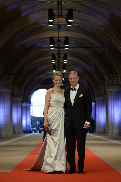 Belgian Crown Prince Philippe R and his wife Crown Princess Mathilde arrive at a gala dinner organised on the eve of the abdication of Queen Beatrix of the Netherlands and the inauguration of her successor King Willem-Alexander at the Rijksmuseum in Ams