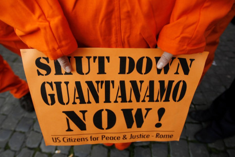 A protester takes part in an Amnesty International demonstration