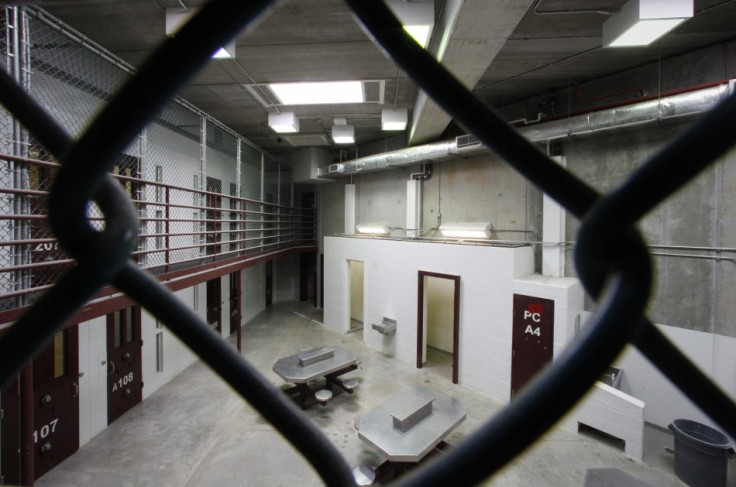 The interior of an unoccupied communal cellblock is seen at Camp VI,