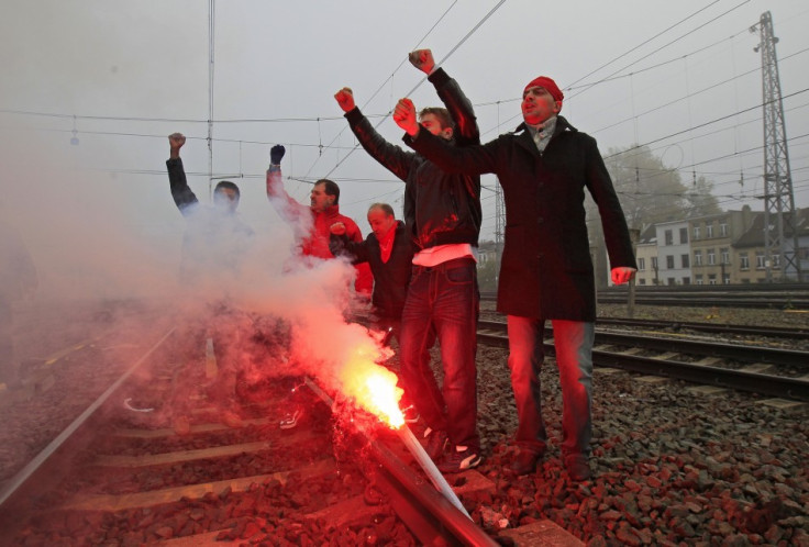 A train carrying chemicals derails in Belgium, kills two and forcing hundreds to flee their homes as deadly fumes spread