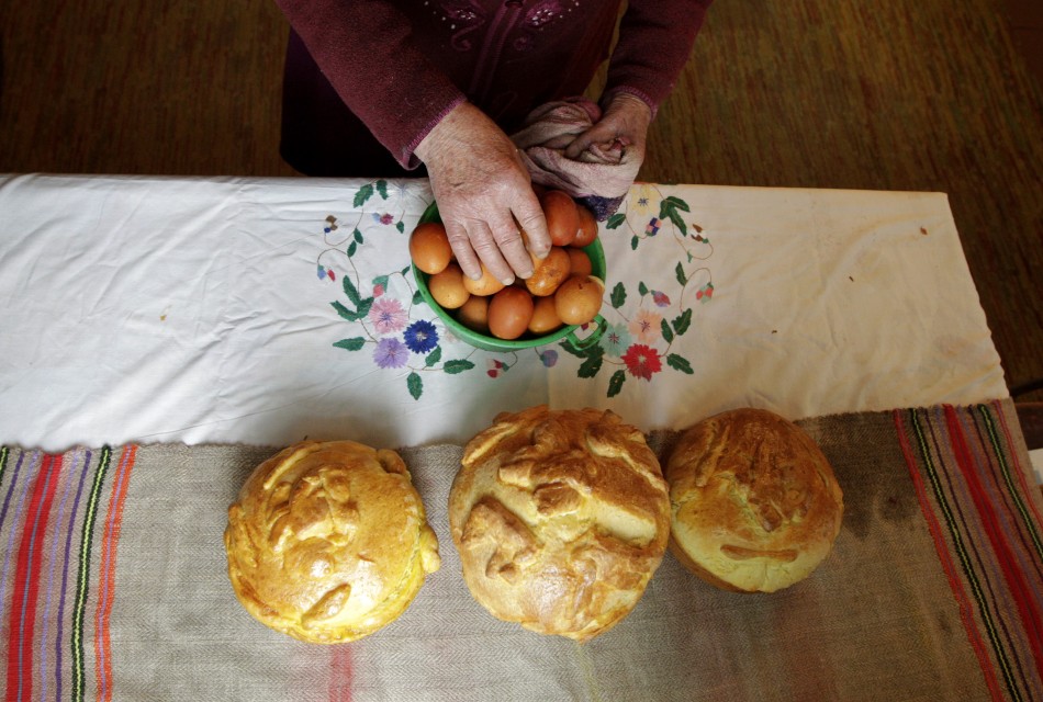 Zosia Kuzmich, 85, bakes cakes on the eve of Orthodox Easter in the village of Pogost, about 250 km 155 miles south of Minsk, May 4, 2013. Orthodox believers mark Easter on Sunday.