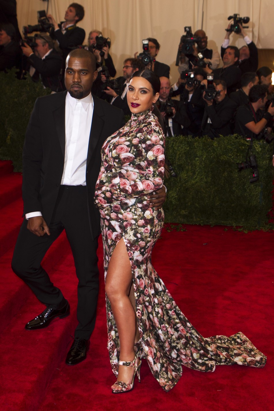 Singer Kanye West and reality television actress Kim Kardashian arrive at the Metropolitan Museum of Art Costume Institute Benefit celebrating the opening of PUNK Chaos to Couture in New York