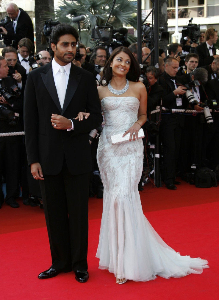Bollywood star Abhishek Bachchan and his wife, Bollywood actress Aishwarya Rai arrive for an evening gala screening of Chinese director Wong Kar Wai's in-competition film "My Blueberry Nights" at the 60th Cannes Film Festival May 16, 2007.(Reute