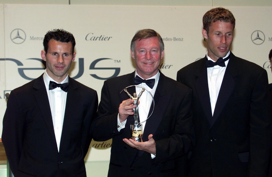 May 25 2000 Ferguson shows his World Team of the Year Laureus sports award in Monte Carlo. The Scot is flanked by United players Giggs L and Ronnie Johnsen. The Laureus sports awards were the first annual ceremony to acknowledge sporting excellence acr