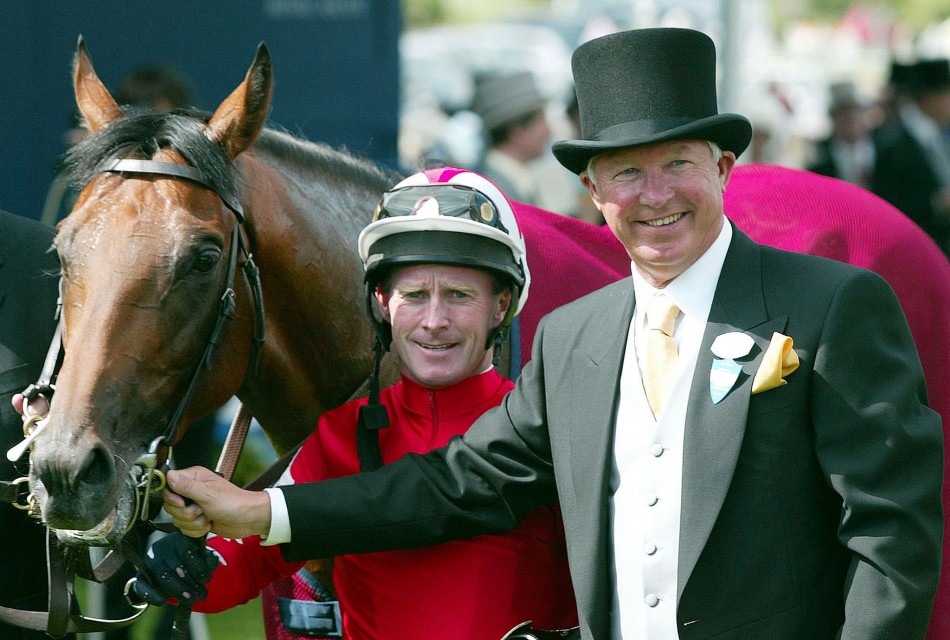 June 18 2002 Ferguson with his horse Rock of Gibraltar and jockey Mick Kinane after winning the St Jamess Palace Stakes on the first day of Royal Ascot in Berkshire.