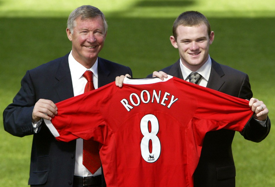 September 1 2004 New United signing Wayne Rooney holds up his club shirt with Ferguson at Old Trafford. A teenage Rooney, who arrived in a 25.6m deal, said United were the only team he wanted to join once he knew the club were interested in him.