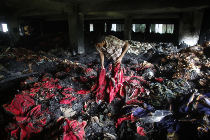 A garment worker inspects a factory belonging to Tung Hai Group,