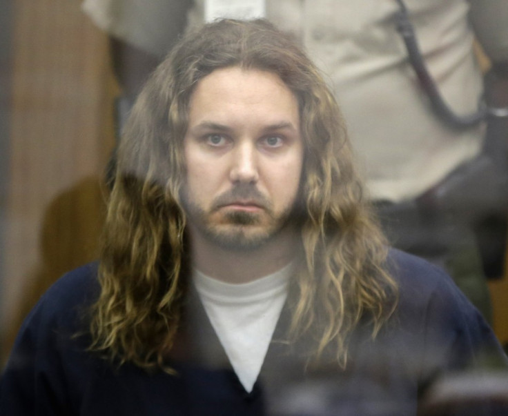 Tim Lambesis appears in court accused of soliciting someone to kill his wife (Reuters)