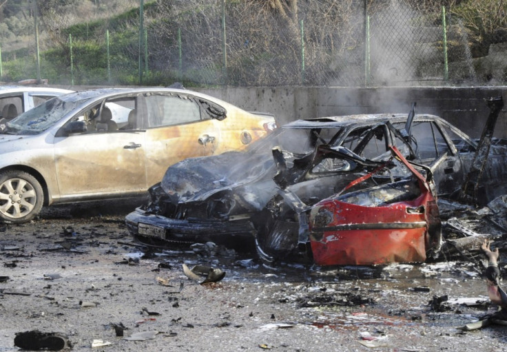 Car bomb blasts have killed at least 40 people in Reyhanli, on Turkey’s border with Syria