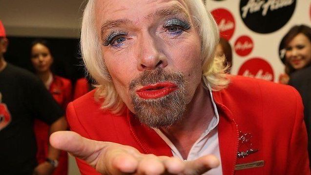 Richard Branson dresses as airline stewardess after losing F1 bet