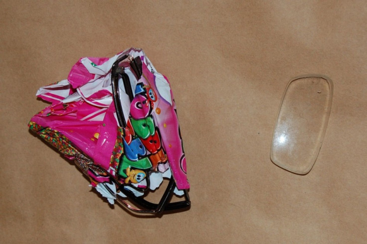 Hazell's broken glasses wrapped in sweet wrapper