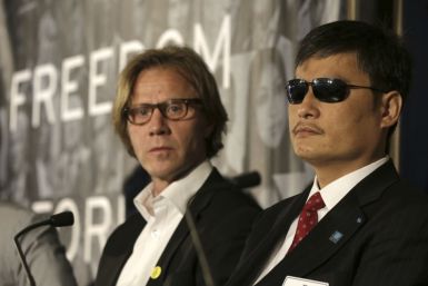 Chen guangcheng and General Secretary of Norwegian Amnesty International Jon Peder Egenaes  at Oslo Freedom Forum