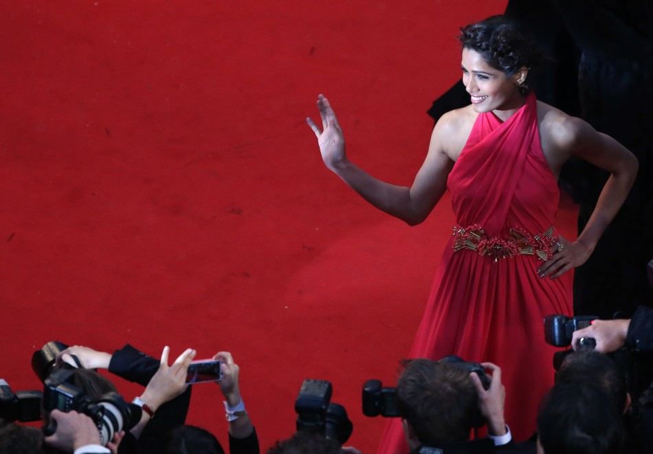 Actress Freida Pinto poses on the red carpet as she arrives for the screening of the film The Great Gatsby and for the opening ceremony of the 66th Cannes Film Festival in Cannes May 15, 2013. The Cannes Film Festival runs from May 15 to May 2