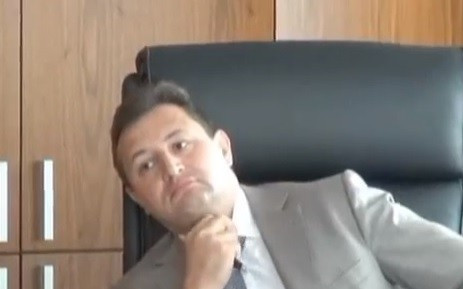 Vladimir Golubkov CEO Rosbank apparently caught in the act by Russia's Interior Ministry in a (Photo:screengrab from the Euronews footage on YouTube)