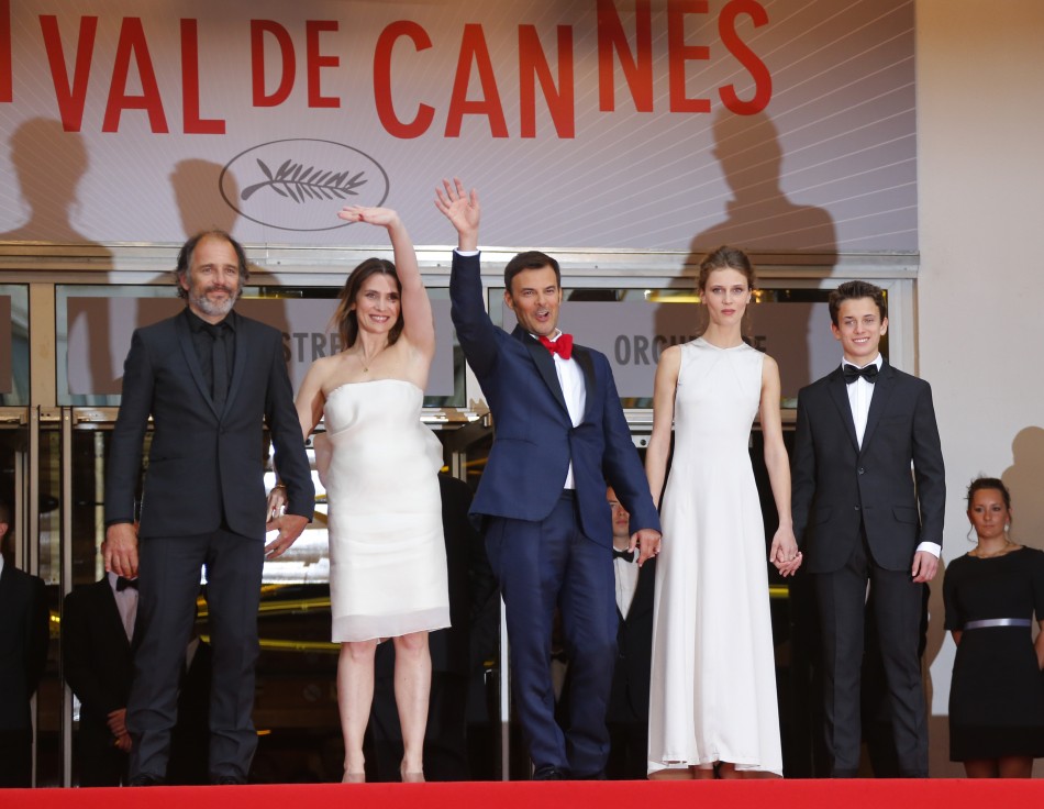 Director Francois Ozon C and cast members Frederic Pierrot L, Geraldine Pailhas 2ndL, Marine Vacth 2ndR and Fantin Ravat pose as they arrive for the screening of the film Jeune  Jolie Young  Beautiful in competition during the 66th