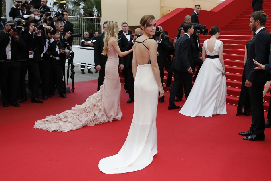 Actress Emma Watson C, cast member of the film The Bling Ring, arrives on the red carpet for the screening of the film Jeune  Jolie Young  Beautiful in competition during the 66th Cannes Film Festival in Cannes May 16, 2013