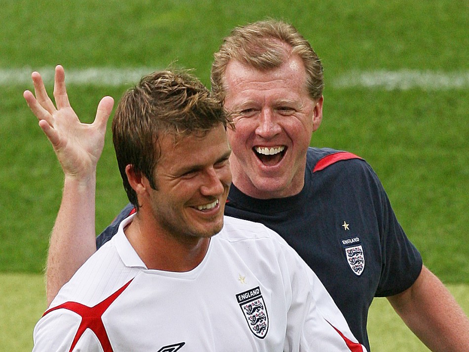 David Beckham L and assistant coach Steve McClaren celebrate after England defeated Trinidad and Tobago in their Group B World Cup 2006 soccer match in Nuremberg June 15, 2006.