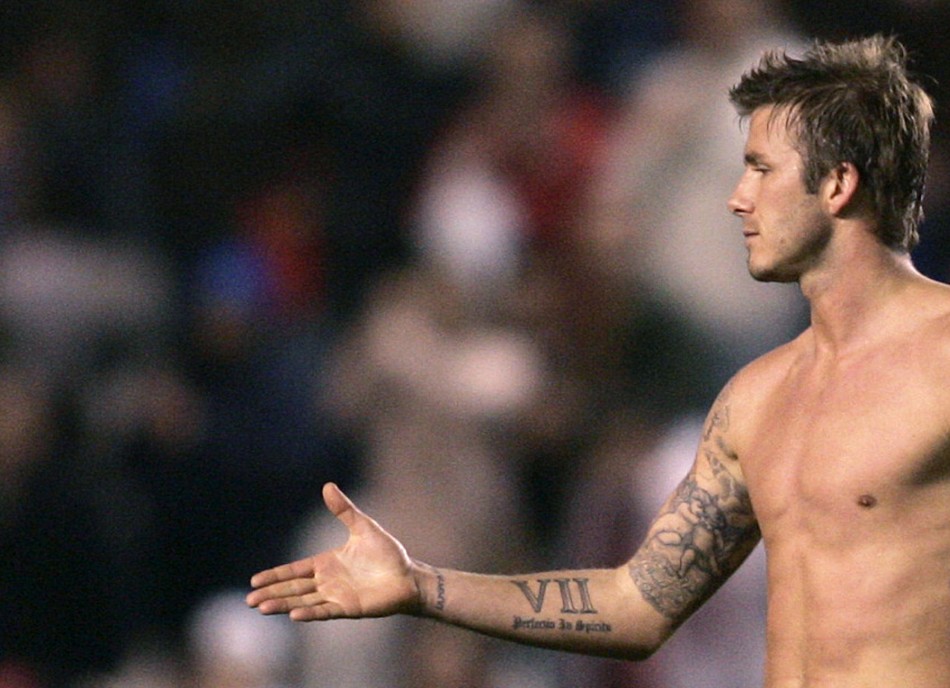 David Beckham gestures after their Spanish First Division soccer match against Deportivo Coruna at Corunas Riazor stadium January 7, 2007.