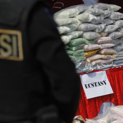 Jakarta police's narcotics division prepare to destroy drugs, which comprised of 362.45 kilograms of crystal methamphetamine, 1,052,000 ecstasy pills, and 118.27 kilograms of marijuana