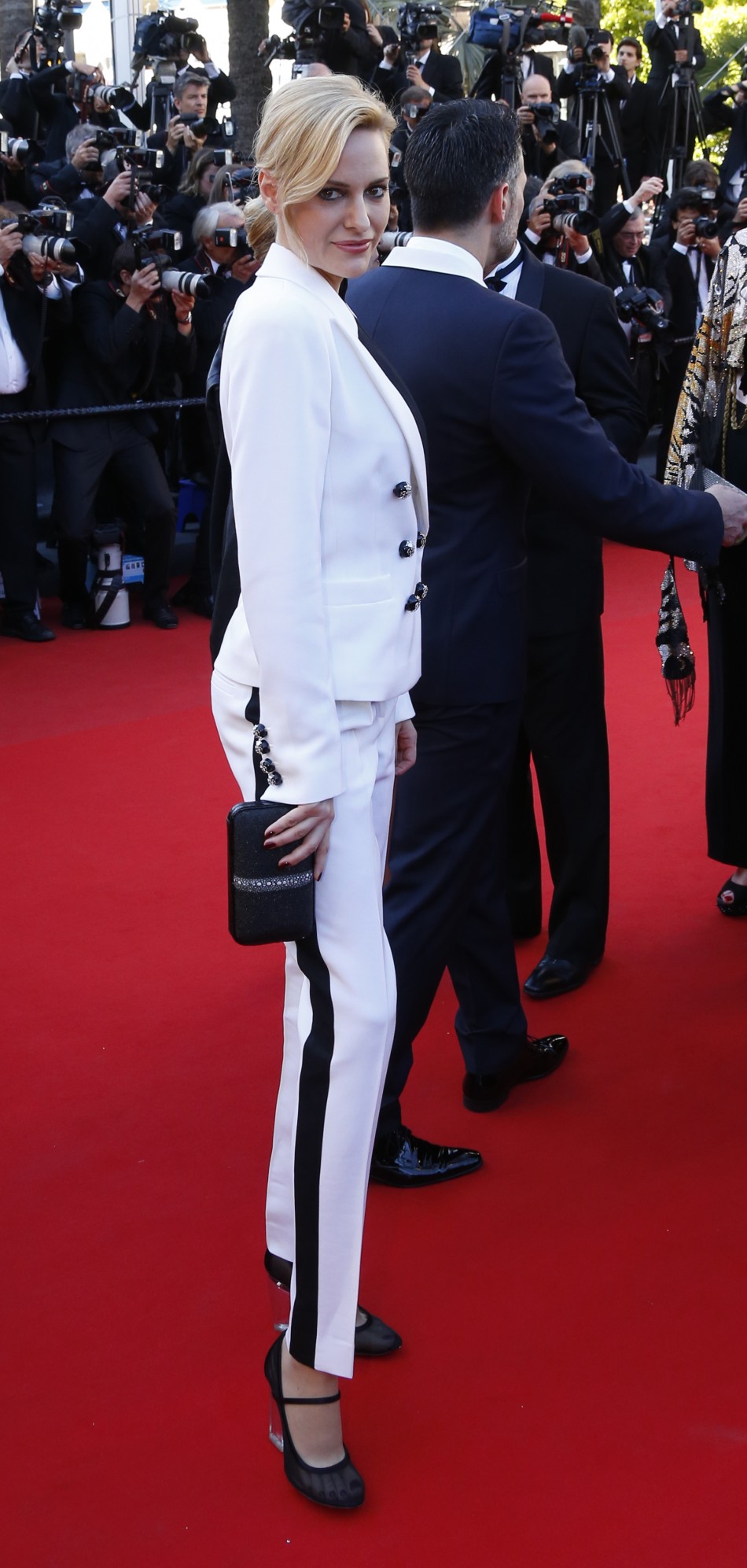 U.S. athlete, actress and fashion model Aimee Mullins poses on the red carpet as she arrives for the screening of the film Le Passe The Past in competition during the 66th Cannes Film Festival in Cannes May 17, 2013