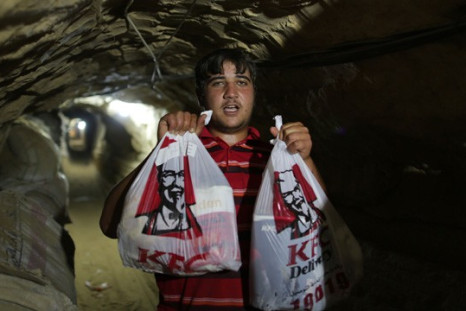 Smuggler delivering KFC through a Gazan underground tunnel