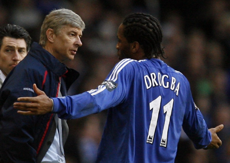 Arsene Wenger and Didier Drogba (R)