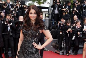 Indian actress Aishwarya Rai poses on the red carpet as she arrives for the screening of the film "Inside Llewyn Davis" in competition during the 66th Cannes Film Festival in Cannes May 19, 2013.