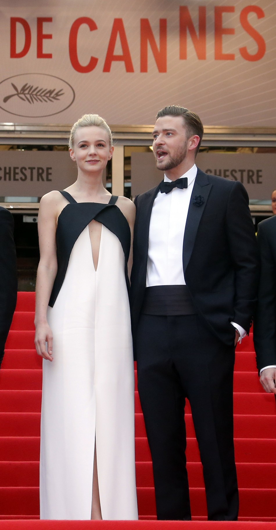 Cast members Carey Mulligan L and Justin Timberlake pose on the red carpet as they arrive for the screening of the film Inside Llewyn Davis in competition during the 66th Cannes Film Festival in Cannes May 19, 2013.