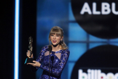 Singer Taylor Swift accepts the award for 'Top Billboard 200 Album' during the Billboard Music Awards at the MGM Grand Garden Arena in Las Vegas, Nevada May 19, 2013.