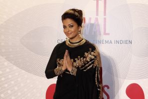 Indian actress Aishwarya Rai poses as she arrives at the evening's gala of the film "Bombay Talkies" celebrating a hundred years of Indian cinema, during the 66th Cannes Film Festival in Cannes May 19, 2013.