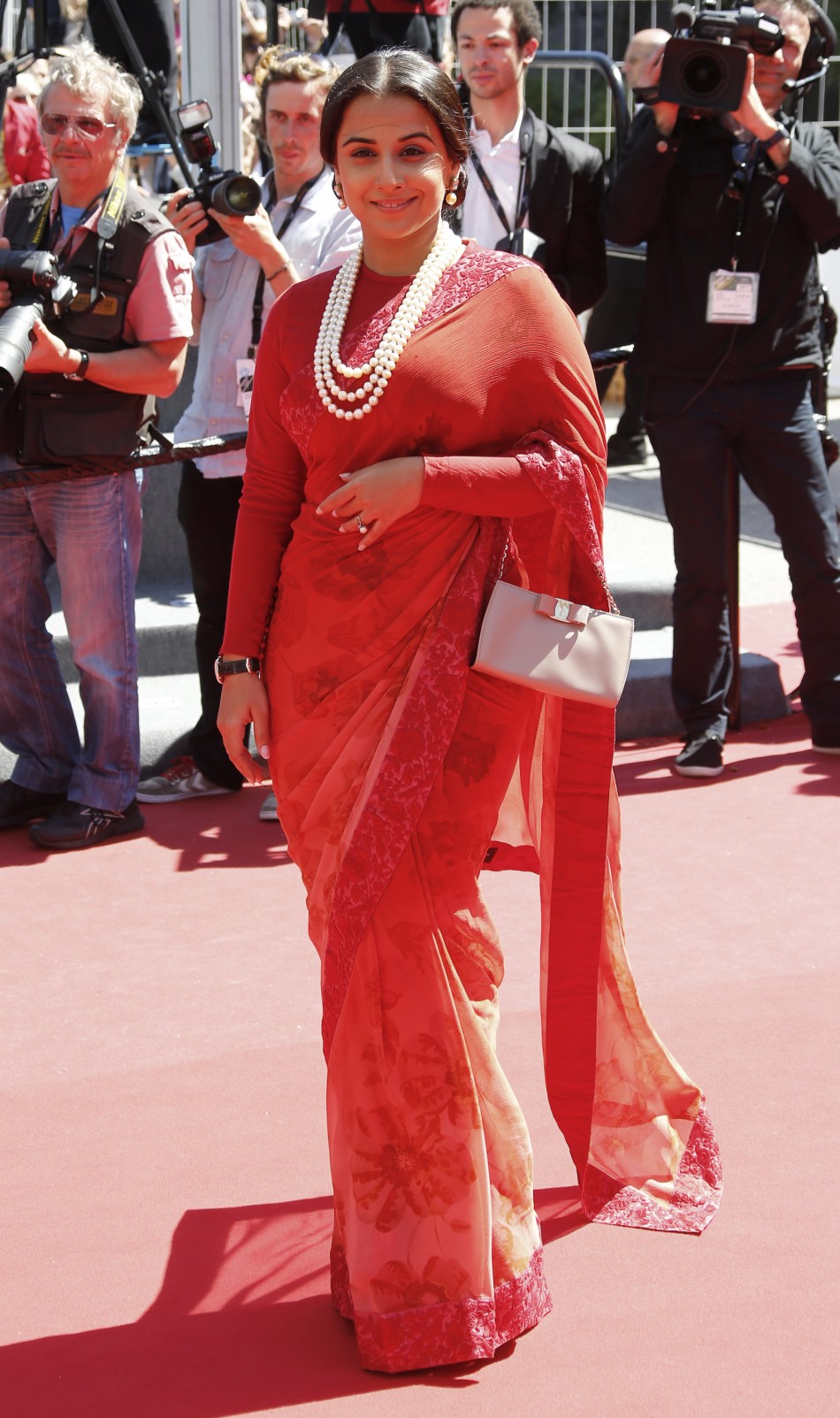 Jury Member actress Vidya Balan poses on the red carpet as she arrives for the screening of the film Un Chateau en Italie in competition during the 66th Cannes Film Festival in Cannes May 20, 2013.