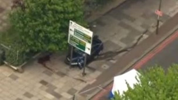 Trails on pavement after Woolwich attack