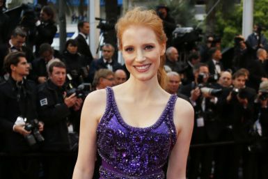 Actress Jessica Chastain poses on the red carpet as she arrives for the screening of the film "All is Lost" during the 66th Cannes Film Festival in Cannes May 22, 2013.
