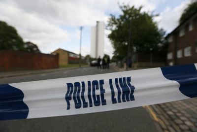 Police tape marks a cordon set up around a crime scene where one man was killed in Woolwich, southeast London May 22, 2013.