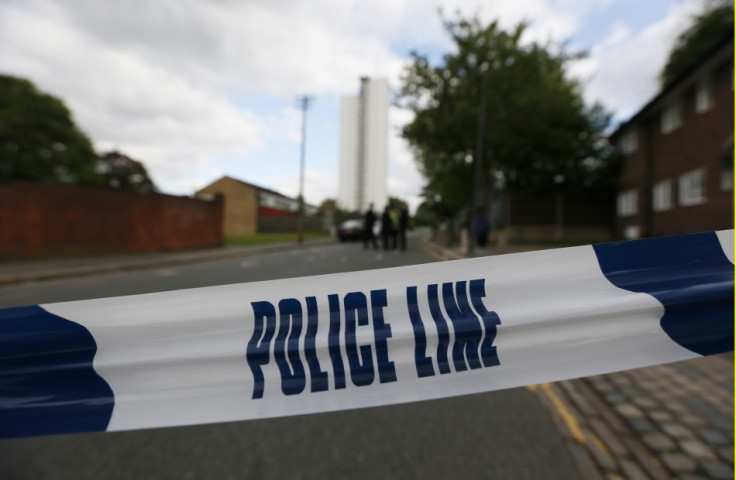 Police tape marks a cordon set up around a crime scene where one man was killed in Woolwich, southeast London May 22, 2013.
